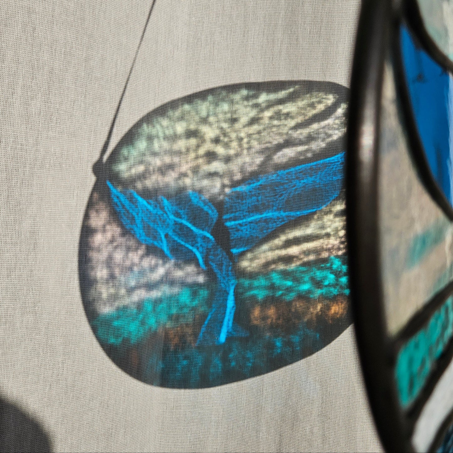 Iridescent Whale Tail Suncatcher